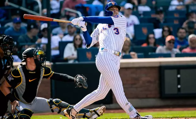 New York Mets center fielder Carson Benge (3) bats at his debut MLB game during the fifth inning of an opening-day baseball game against the Pittsburgh Pirates, Thursday, March 26, 2026, in New York. (AP Photo/Angelina Katsanis)