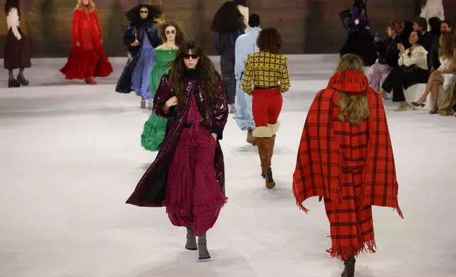 Models wear creations from the Chloe Fall/Winter 2026-2027 Women's collection presented in Paris, Thursday, March 5, 2026. (AP Photo/Tom Nicholson)