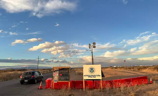 A sign marks the entrance to a series of hardened tents at the Camp East Montana immigrant detention center in the desert at a U.S. Army base on the outskirts of El Paso, Texas, Friday, Feb. 13, 2026. (AP Photo/Morgan Lee)