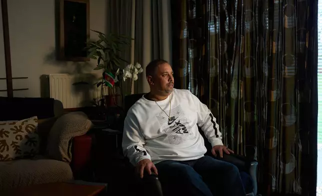 Owen Ramsingh, who spent months in Camp East Montana before his deportation to The Netherlands, poses for a portrait in his father's home in Utrecht, Netherlands, Sunday, March 1, 2026. (AP Photo/Bram Janssen)