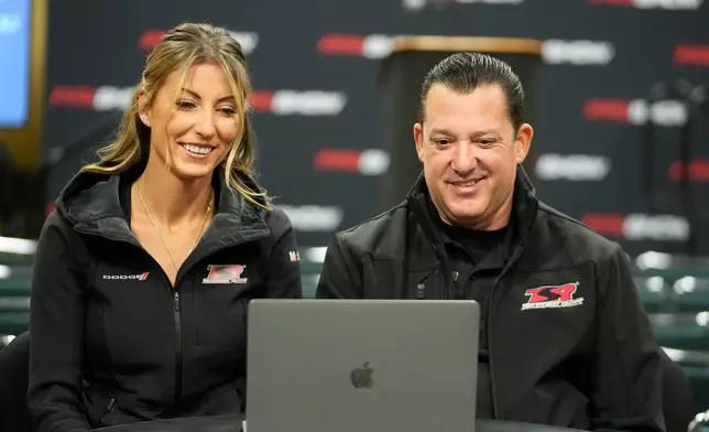 FILE - Leah Pruett and her husband Tony Stewart speak during a news conference, Thursday, Dec. 7, 2023, in Indianapolis. (AP Photo/Darron Cummings, File)