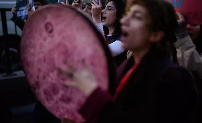 Women shout slogans as they march during a protest marking the International Women's Day, in Istanbul, Turkey, Sunday, March 8, 2026. (AP Photo/Khalil Hamra)