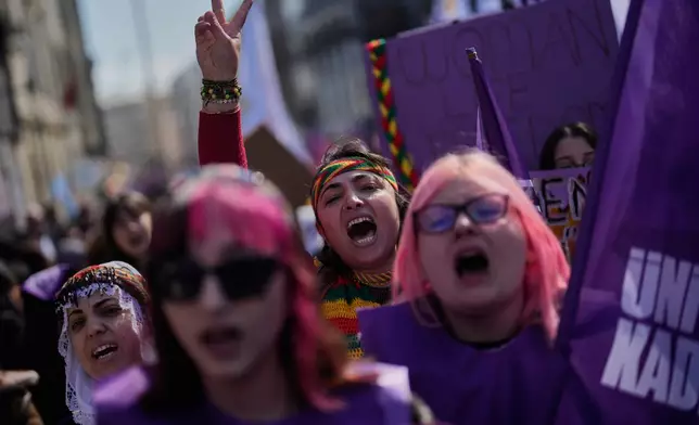 Women shout slogans as they march during a protest marking the International Women's Day, in Istanbul, Turkey, Sunday, March 8, 2026. (AP Photo/Khalil Hamra)