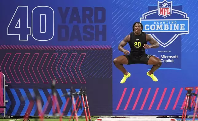 Ohio State linebacker Arvell Reese (20) gets ready to run the 40-yard dash at the NFL football scouting combine in Indianapolis, Thursday, Feb. 26, 2026. (AP Photo/Michael Conroy)