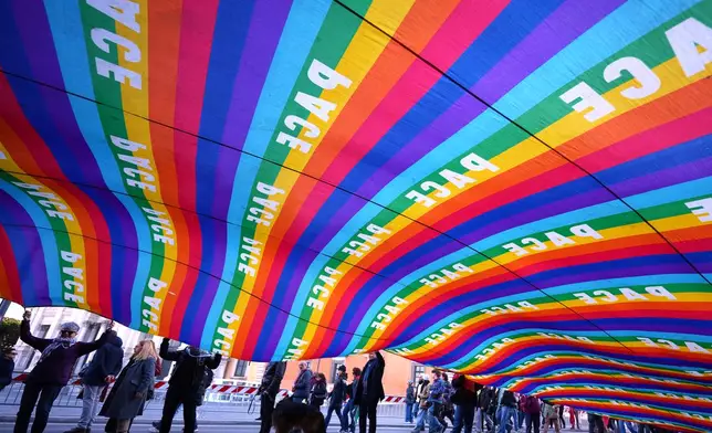 People take part in a national anti-war demonstration organized by "No Kings Italy movement" in Rome, Saturday, March 28, 2026. (AP Photo/Andrew Medichini)