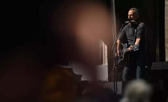 Bruce Springsteen performs during the "No Kings" protest Saturday, March 28, 2026, in St. Paul, Minn. (AP Photo/Tom Baker)