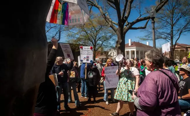 Demonstrators gather for the "No Kings" rally at Wilson Park in Florence, Ala, on Saturday, March 28, 2026. (Dan Busey/The TimesDaily via AP)