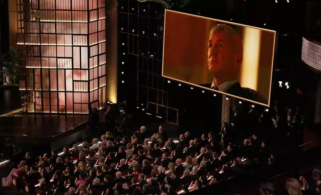 Sean Penn wins the award for best performance by an actor in a supporting role for "One Battle After Another" during the Oscars on Sunday, March 15, 2026, at the Dolby Theatre in Los Angeles. (AP Photo/Chris Pizzello)