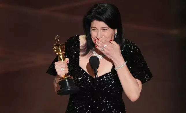 Cassandra Kulukundis accepts the award for casting for "One Battle After Another" during the Oscars on Sunday, March 15, 2026, at the Dolby Theatre in Los Angeles. (AP Photo/Chris Pizzello)