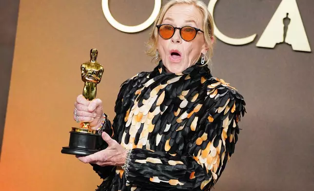 Amy Madigan, winner of the award for actress in a supporting role for "Weapons," poses in the press room at the Oscars on Sunday, March 15, 2026, at the Dolby Theatre in Los Angeles. (Photo by Jordan Strauss/Invision/AP)