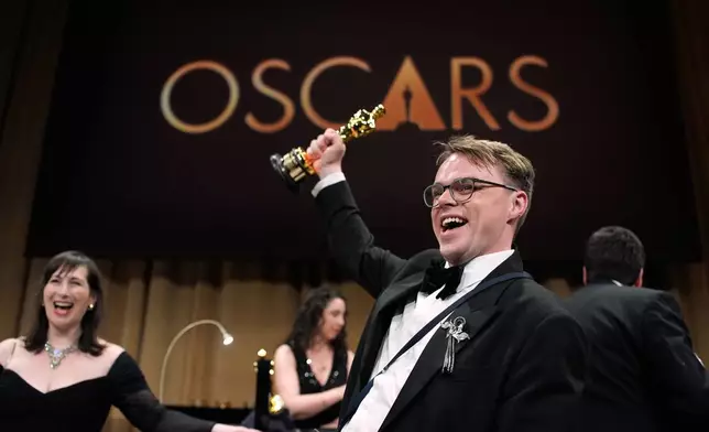 Pavel Talankin, winner of the award for documentary feature film for "Mr. Nobody against Putin," attends the Governors Ball after the Oscars on Sunday, March 15, 2026, in Los Angeles. (AP Photo/John Locher)