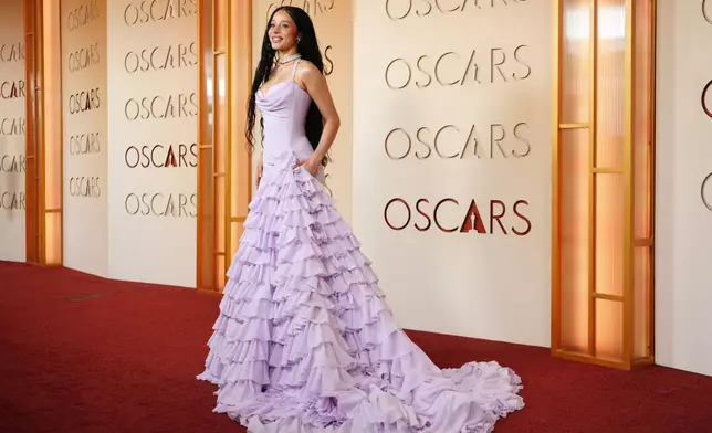 Chase Infiniti arrives at the Oscars on Sunday, March 15, 2026, at the Dolby Theatre in Los Angeles. (Photo by Jordan Strauss/Invision/AP)