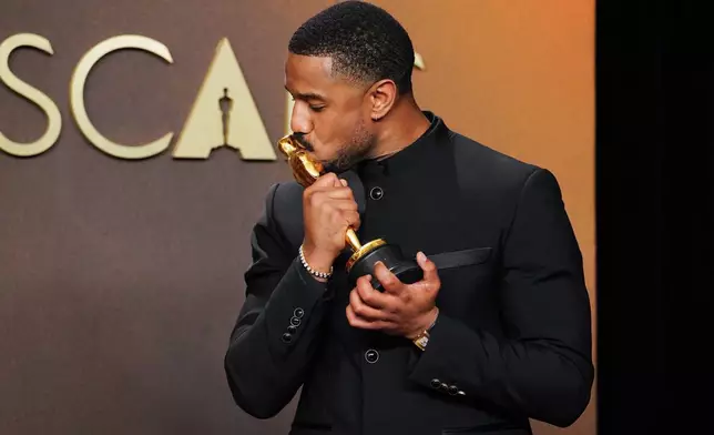 Michael B. Jordan, winner of the award for actor in a leading role for "Sinners," poses in the press room at the Oscars on Sunday, March 15, 2026, at the Dolby Theatre in Los Angeles. (Photo by Jordan Strauss/Invision/AP)