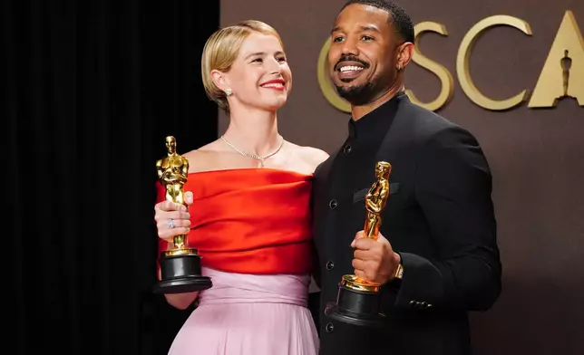 Jessie Buckley, left, winner of the award for best actress in a leading role for "Hamnet," and Michael B. Jordan, winner of the award for best actor in a leading role for "Sinners," pose in the press room at the Oscars on Sunday, March 15, 2026, at the Dolby Theatre in Los Angeles. (Photo by Jordan Strauss/Invision/AP)