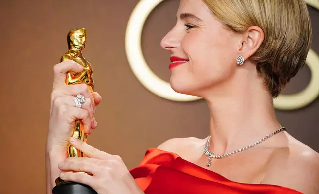 Jessie Buckley, winner of the award for actress in a leading role for "Hamnet," poses in the press room at the Oscars on Sunday, March 15, 2026, at the Dolby Theatre in Los Angeles. (Photo by Jordan Strauss/Invision/AP)