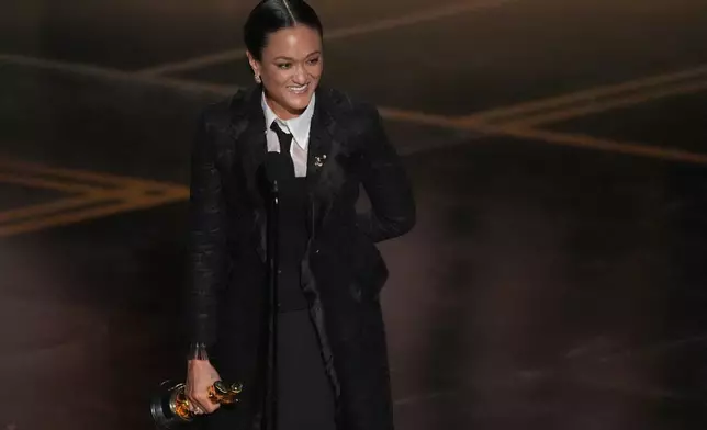 Autumn Durald Arkapaw accepts the award for cinematography for "Sinners" during the Oscars on Sunday, March 15, 2026, at the Dolby Theatre in Los Angeles. (AP Photo/Chris Pizzello)