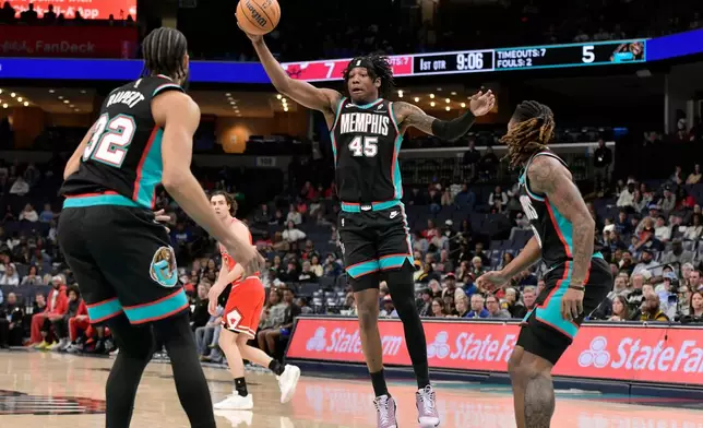 Memphis Grizzlies forward GG Jackson II (45) grabs a rebound in the first half of an NBA basketball game against the Chicago Bulls Saturday, March 28, 2026, in Memphis, Tenn. (AP Photo/Brandon Dill)