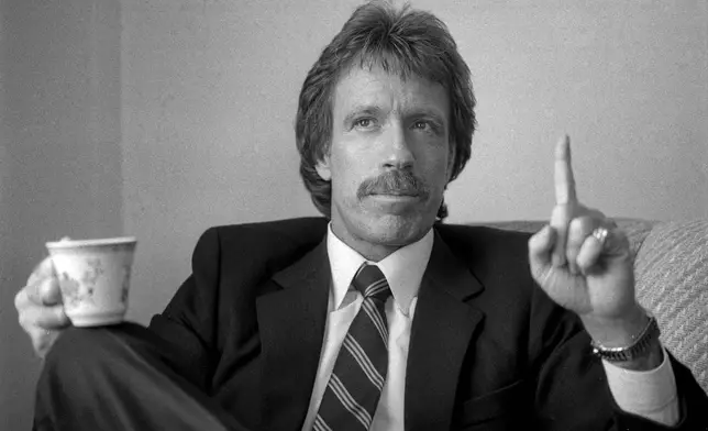 FILE - Chuck Norris, actor, mixed-martial arts champion and Air Force veteran, speaks during a promotional tour of "The Delta Force" movie in San Francisco on Feb. 4, 1986. (Steve Ringman/San Francisco Chronicle via AP, File)