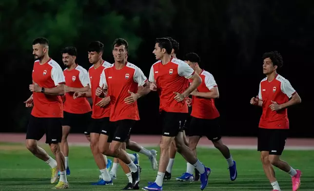 Iraq's players jog during a training session ahead of a World Cup 2026 qualifying soccer match against Bolivia in Monterrey, Mexico, Monday, March 30, 2026. (AP Photo/Fernando Llano)