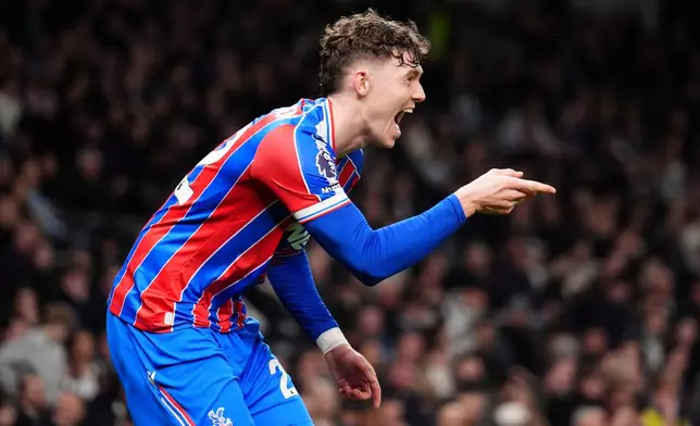 Crystal Palace's Jorgen Strand Larsen celebrates scoring their second goal during the English Premier League soccer match between Tottenham Hotspur and Crystal Palace in London, Thursday March 5, 2026. (John Walton/PA via AP)