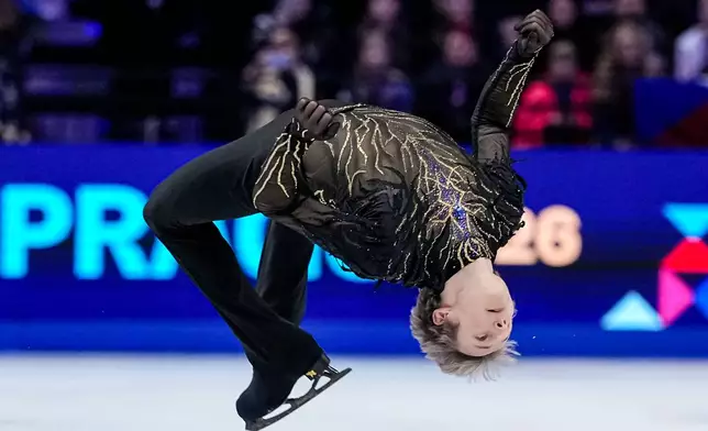 Ilia Malinin from the United States competes during the men free skating at the Figure Skating World Championships in Prague, Czech Republic, Saturday, March 28, 2026. (AP Photo/Petr David Josek)