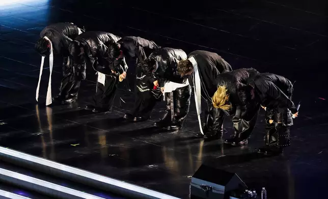 Kpop group BTS bows at the end of their 'BTS The Comeback Live Arirang' concert in central Seoul, South Korea, March 21, 2026. (Kim Hong-Ji/Pool Photo via AP)
