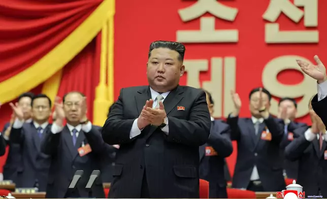 FILE - This photo provided by the North Korean government, its leader Kim Jong Un, center, claps hands as he was re-elected to the top post of the ruling Workers' Party, during the party's Congress in Pyongyang, on Feb. 22, 2026. Independent journalists were not given access to cover the event depicted in this image distributed by the North Korean government. The content of this image is as provided and cannot be independently verified. Korean language watermark on image as provided by source reads: "KCNA" which is the abbreviation for Korean Central News Agency. (Korean Central News Agency/Korea News Service via AP, File)