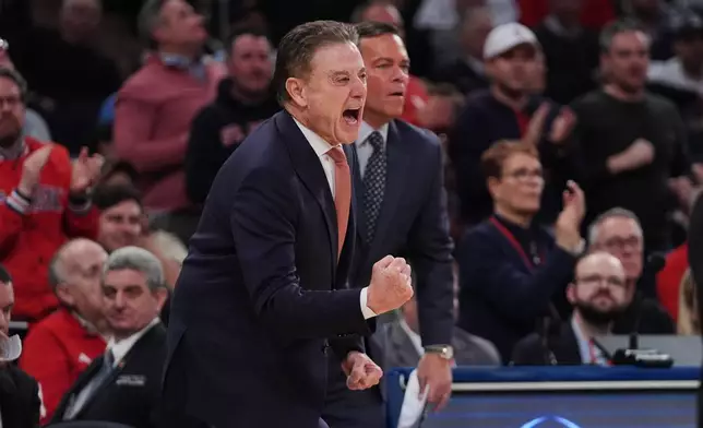 St. John's Red Storm head coach Rick Pitino calls out to his team during the second half of an NCAA college basketball game against the Georgetown Hoyas Tuesday, March 3, 2026, in New York. (AP Photo/Frank Franklin II)
