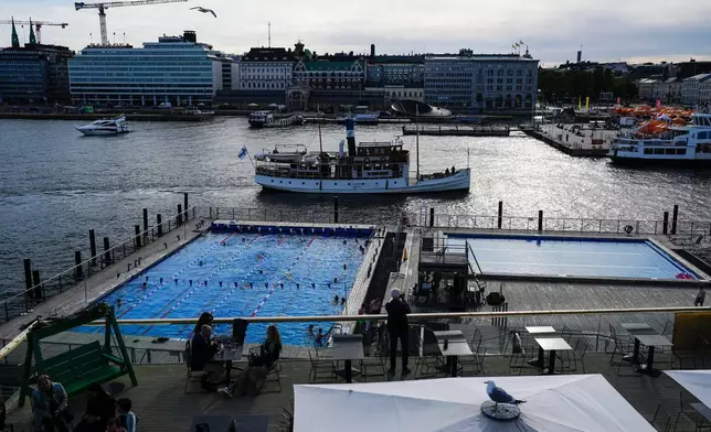 FILE - Outdoor swimming pools are seen in a harbor of Helsinki, May 29, 2023. (AP Photo/Pavel Golovkin, File)