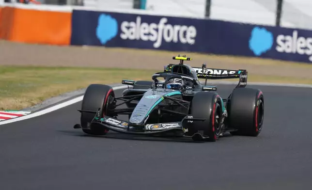 Mercedes driver Kimi Antonelli of Italy steers his car during the qualifying session of the Japanese Formula One Grand Prix at the Suzuka Circuit in Suzuka, Japan, Saturday, March 28, 2026. (AP Photo/Eugene Hoshiko)