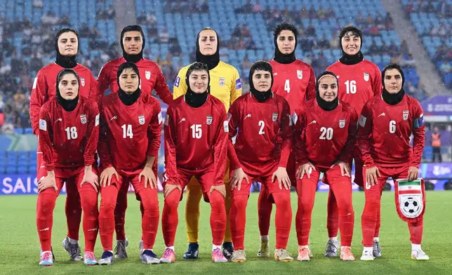 FILE - Iran players pose for a team photo ahead of the Women's Asian Cup soccer match between Iran and the Philippines in Robina, Australia, Sunday, March 8, 2026. (Dave Hunt/AAPImage via AP,File)