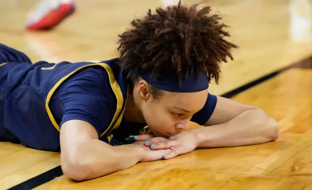 Notre Dame guard Hannah Hidalgo reacts after being fouled by UConn during the second half in the Elite Eight of the NCAA college basketball tournament, Sunday, March 29, 2026, in Fort Worth, Texas. (AP Photo/Tony Gutierrez)