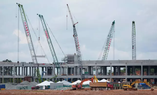 FILE -A data center building is seen under construction in Sedenak Tech Park in Johor state of Malaysia, Sept. 27, 2024. (AP Photo/Vincent Thian, File)