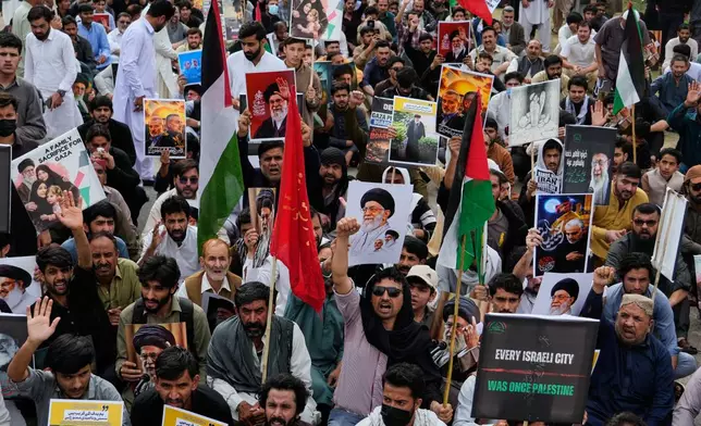 Shiite Muslims take part in a rally to condemn the killing of Iranian Supreme Leader Ayatollah Ali Khamenei and against the Israeli strikes on Iran, in Islamabad, Pakistan, Friday, March 6, 2026. (AP Photo/Anjum Naveed)
