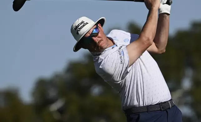 FILE - Joel Dahmen hits from the second tee of the South Course at Torrey Pines during the third round of the Farmers Insurance Open golf tournament Jan. 31, 2026, in San Diego. (AP Photo/Denis Poroy, File)