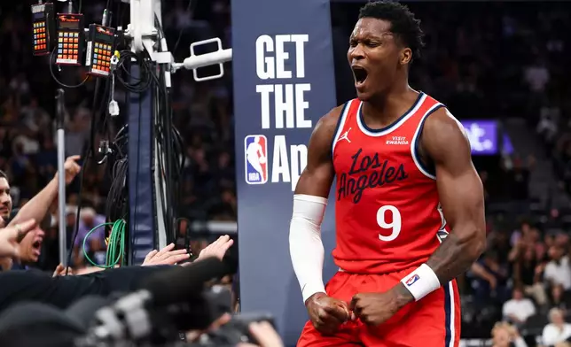 Los Angeles Clippers guard Bennedict Mathurin (9) reacts towards the crowd after scoring a basket and drawing a foul during the second half of an NBA basketball game against the Sacramento Kings, Saturday, March 14, 2026, in Inglewood, Calif. (AP Photo/Jessie Alcheh)