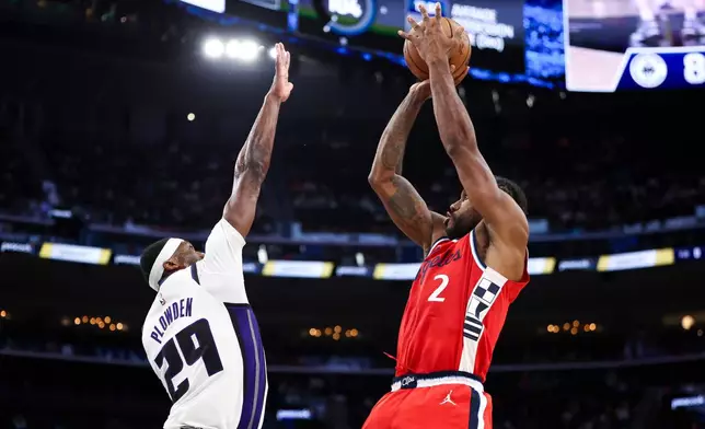 Los Angeles Clippers forward Kawhi Leonard (2) shoots against Sacramento Kings guard Daeqwon Plowden (29) during the second half of an NBA basketball game, Saturday, March 14, 2026, in Inglewood, Calif. (AP Photo/Jessie Alcheh)