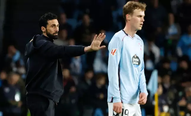 Real Madrid's head coach Alvaro Arbeloa gives instruction inside the box team area during a Spanish La Liga soccer match between Celta Vigo and Real Madrid in Vigo, Spain, Friday, March 6, 2026. (AP Photo/Lalo R. Villar)