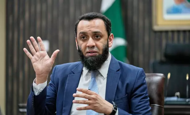 Pakistan's Information Minister Attaullah Tarar speaks during an interview with The Associated Press, in Islamabad, Wednesday, March 18, 2026. (AP Photo/Anjum Naveed)