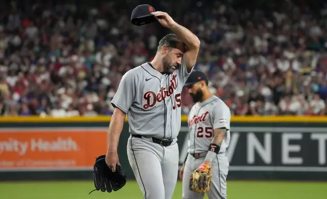 Detroit Tigers pitcher Justin Verlander wipes his brow as he walks off the field during the fourth inning of an opening-day baseball game against the Arizona Diamondbacks Monday, March 30, 2026, in Phoenix. (AP Photo/Darryl Webb)