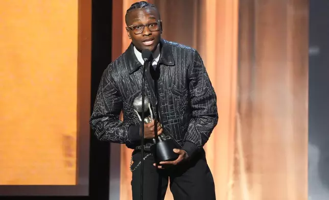 Miles Caton accepts the award for outstanding breakthrough performance in a motion picture for "Sinners" during the 57th NAACP Image Awards on Saturday, Feb. 28, 2026, in Pasadena, Calif. (AP Photo/Chris Pizzello)