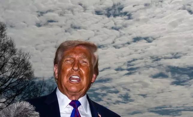 President Donald Trump speaks with reporters before departing on Marine One from the South Lawn of the White House, Wednesday, March 11, 2026, in Washington. (AP Photo/Alex Brandon)