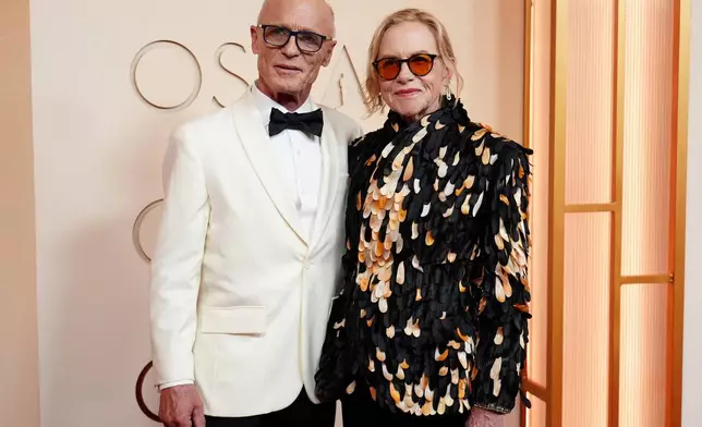 Ed Harris and Amy Madigan arrive at the Oscars on Sunday, March 15, 2026, at the Dolby Theatre in Los Angeles. (Photo by Richard Shotwell/Invision/AP)