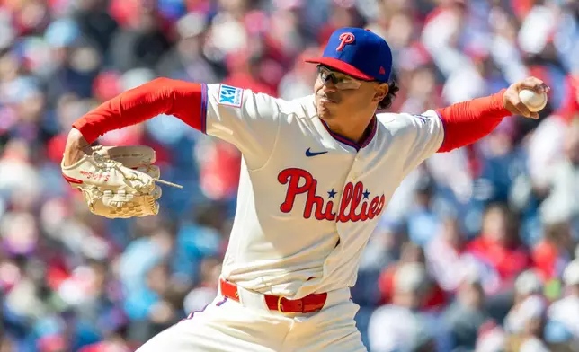 Philadelphia Phillies pitcher Jesús Luzardo throws in the third inning of a baseball game against the Texas Rangers, Sunday, March 29, 2026, in Philadelphia. (AP Photo/Laurence Kesterson)
