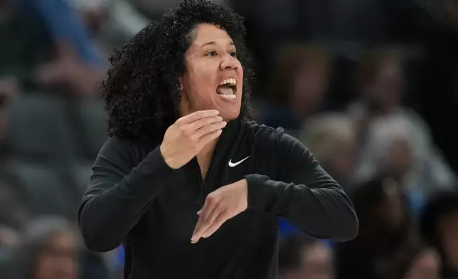 FILE - Duke head coach Kara Lawson reacts to a play during the first half of an NCAA college basketball game against UCLA in the Players Era tournament in Las Vegas, Nov. 27, 2025. (AP Photo/Eric Gay, File)