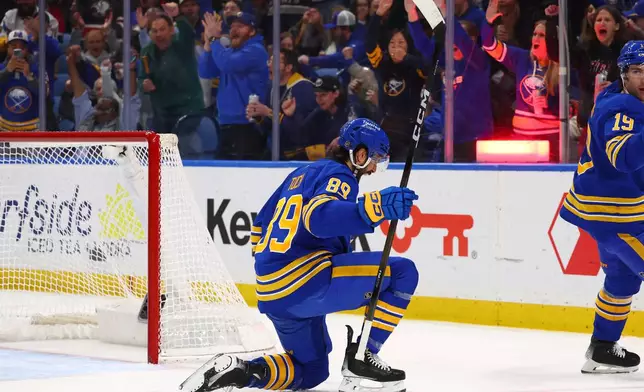 Buffalo Sabres right wing Alex Tuch (89) celebrates his goal during the first period of an NHL hockey game against the San Jose Sharks, Tuesday, March 10, 2026, in Buffalo, N.Y. (AP Photo/Jeffrey T. Barnes)