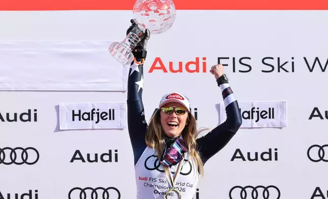 United States' Mikaela Shiffrin celebrates winning the women's overall World Cup skiing title, at the Lillehammer World Cup Finals, in Hafjell, Norway, Wednesday, March 25, 2026. (AP Photo/Marco Trovati)