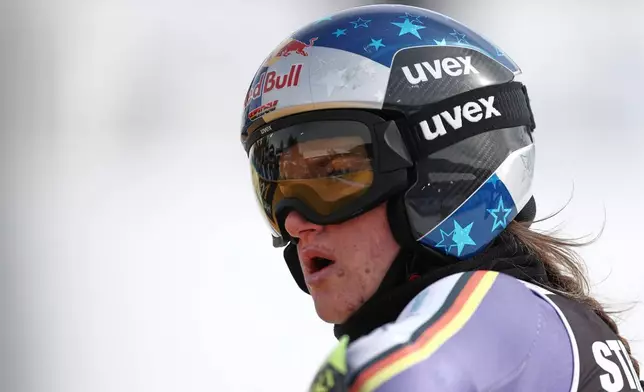 Germany's Emma Aicher at the finish area of an alpine ski, women's giant slalom race, at the Lillehammer World Cup Finals, in Hafjell, Norway, Wednesday, March 25, 2026. (AP Photo/Gabriele Facciotti)