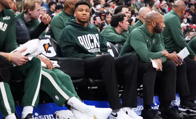 Milwaukee Bucks forward Giannis Antetokounmpo watches teammates during the first half of an NBA basketball game against the Chicago Bulls in Chicago, Sunday, March 1, 2026. (AP Photo/Nam Y. Huh)