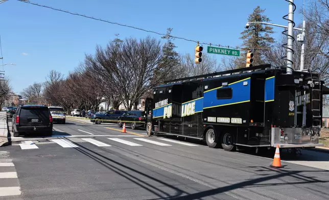 A Baltimore Police mobile command center is seen near the scene of a shooting Tuesday, March 10, 2026, in Baltimore. (AP Photo/KT Kanazawich)